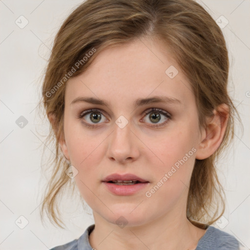 Joyful white young-adult female with medium  brown hair and green eyes