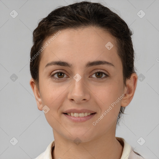 Joyful white young-adult female with short  brown hair and brown eyes