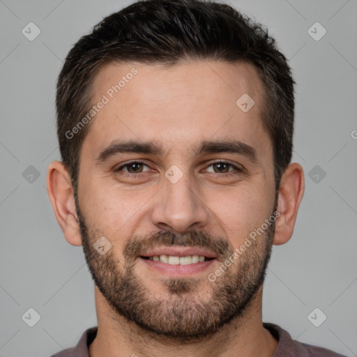 Joyful white young-adult male with short  brown hair and brown eyes