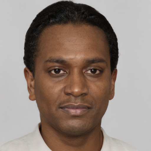 Neutral black young-adult male with short  black hair and brown eyes