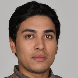 Neutral latino young-adult male with short  brown hair and brown eyes