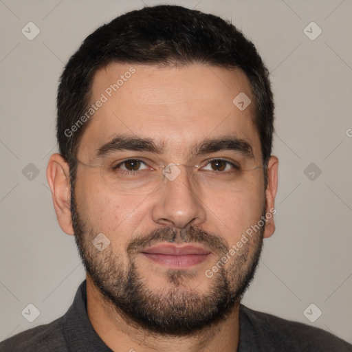 Joyful white adult male with short  brown hair and brown eyes