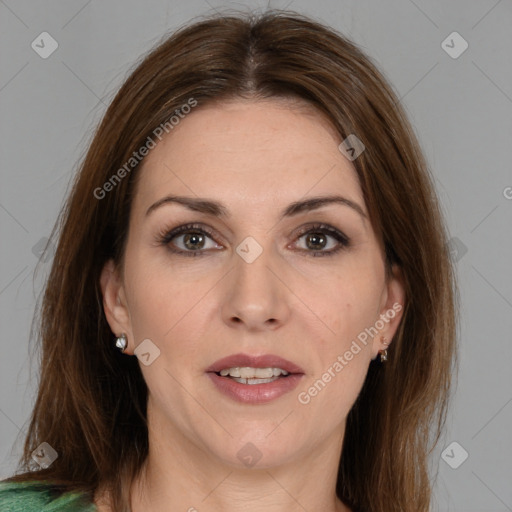 Joyful white adult female with medium  brown hair and brown eyes