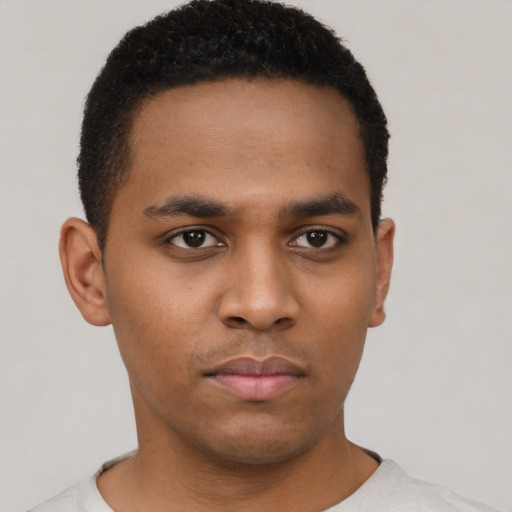 Neutral black young-adult male with short  brown hair and brown eyes