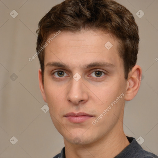 Neutral white young-adult male with short  brown hair and grey eyes