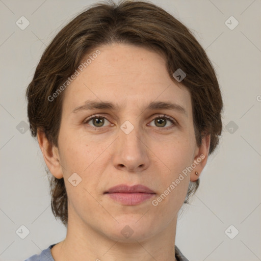 Joyful white adult female with medium  brown hair and grey eyes