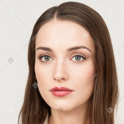 Neutral white young-adult female with long  brown hair and brown eyes