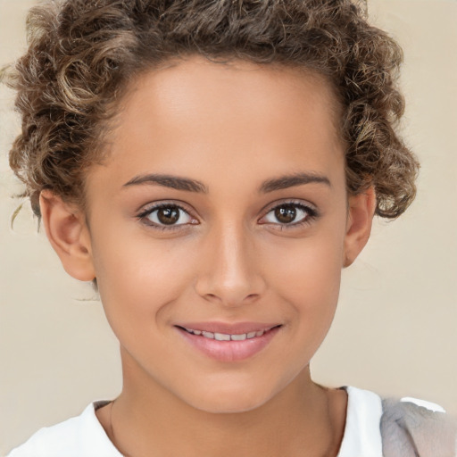 Joyful white child female with short  brown hair and brown eyes