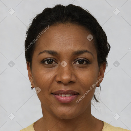 Joyful black young-adult female with short  brown hair and brown eyes