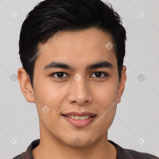 Joyful asian young-adult male with short  brown hair and brown eyes