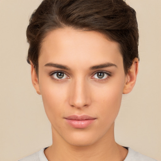 Neutral white young-adult female with short  brown hair and brown eyes