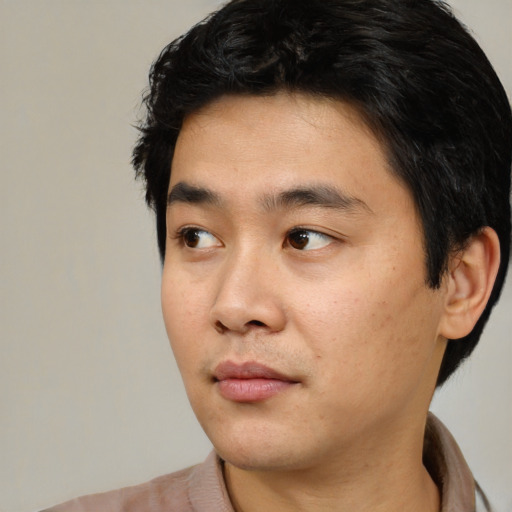Neutral asian young-adult male with short  black hair and brown eyes