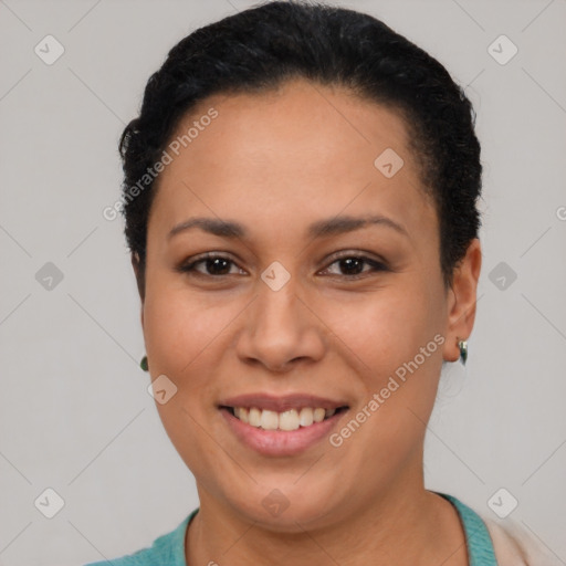 Joyful latino young-adult female with short  brown hair and brown eyes