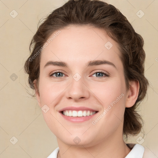 Joyful white young-adult female with medium  brown hair and green eyes