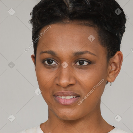 Joyful black young-adult female with short  brown hair and brown eyes