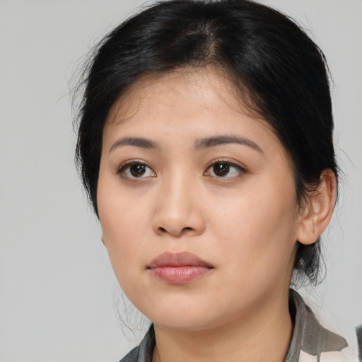 Neutral asian young-adult female with medium  black hair and brown eyes