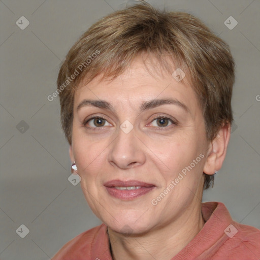 Joyful white adult female with short  brown hair and grey eyes