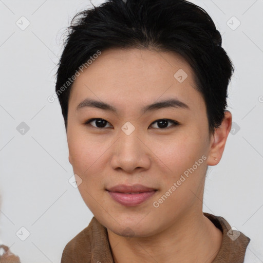 Joyful asian young-adult female with short  brown hair and brown eyes