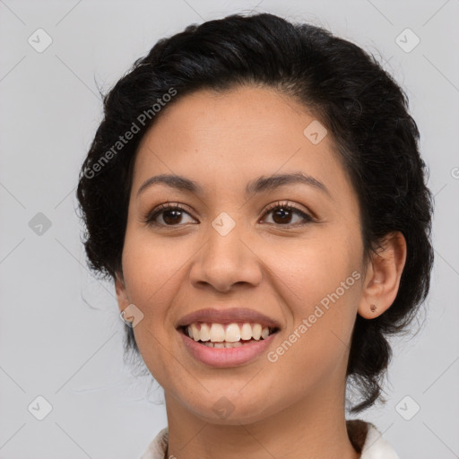 Joyful latino young-adult female with medium  black hair and brown eyes