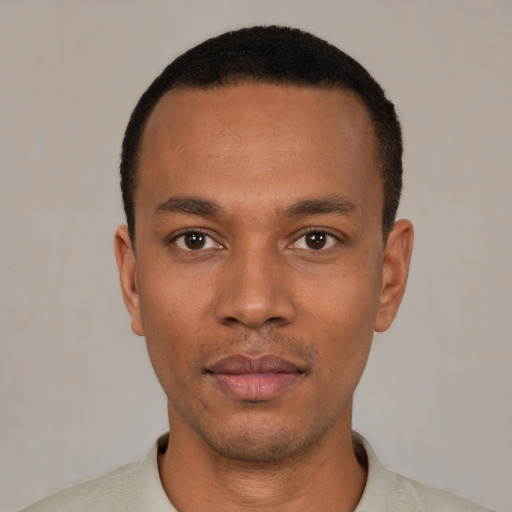 Neutral black young-adult male with short  black hair and brown eyes