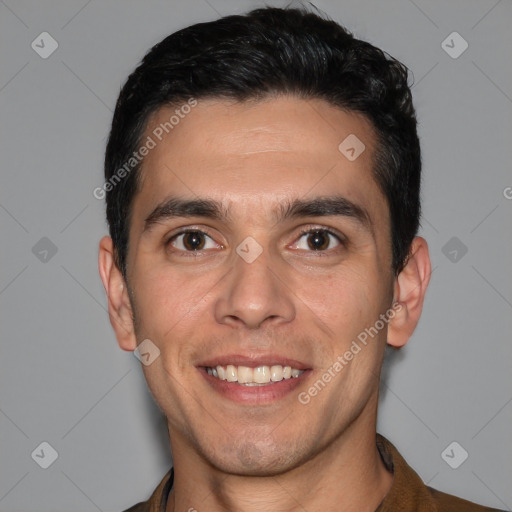 Joyful white young-adult male with short  black hair and brown eyes