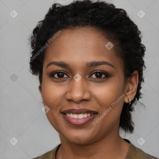 Joyful black young-adult female with short  brown hair and brown eyes