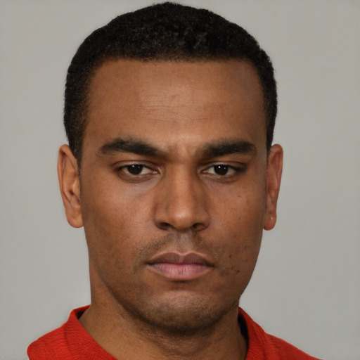 Neutral black young-adult male with short  black hair and brown eyes
