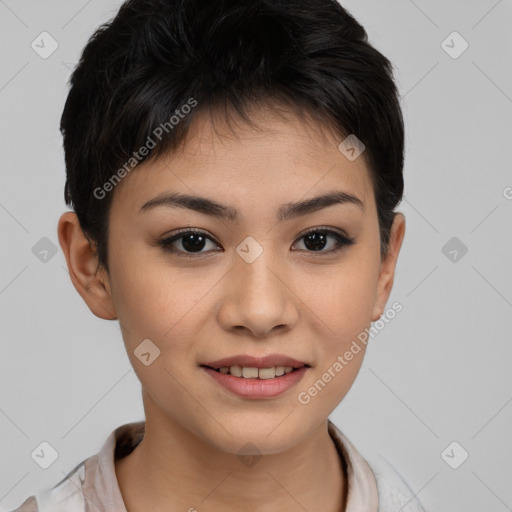 Joyful asian young-adult female with short  brown hair and brown eyes