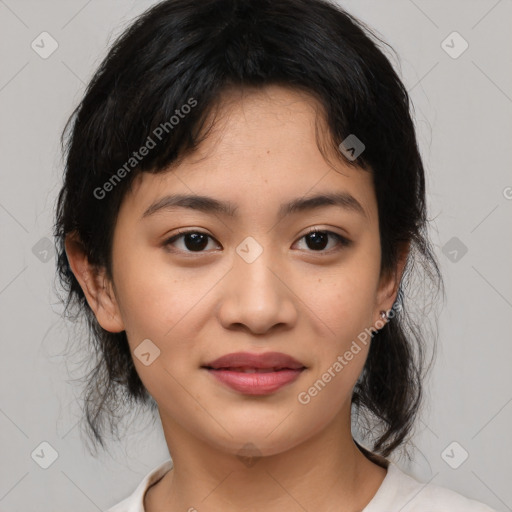 Joyful asian young-adult female with medium  black hair and brown eyes