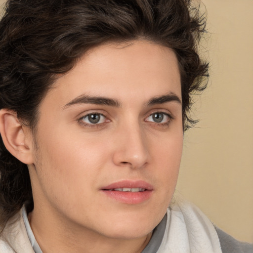 Joyful white young-adult male with medium  brown hair and brown eyes