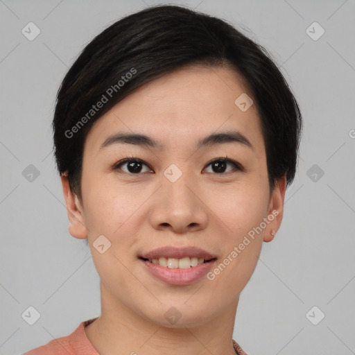 Joyful asian young-adult female with short  black hair and brown eyes