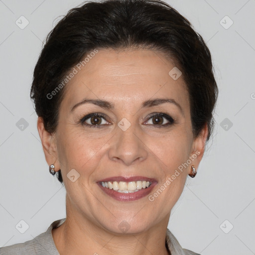 Joyful white adult female with short  brown hair and brown eyes