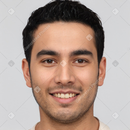 Joyful white young-adult male with short  black hair and brown eyes