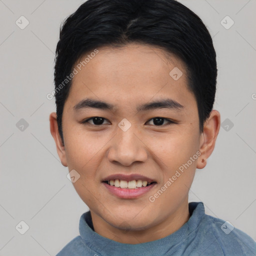 Joyful asian young-adult male with short  black hair and brown eyes