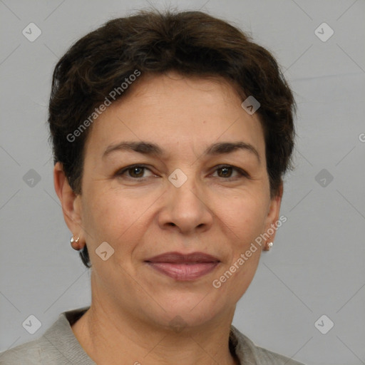 Joyful white adult female with short  brown hair and grey eyes