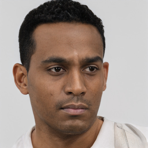 Neutral black young-adult male with short  black hair and brown eyes