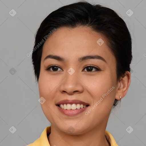 Joyful asian young-adult female with medium  brown hair and brown eyes