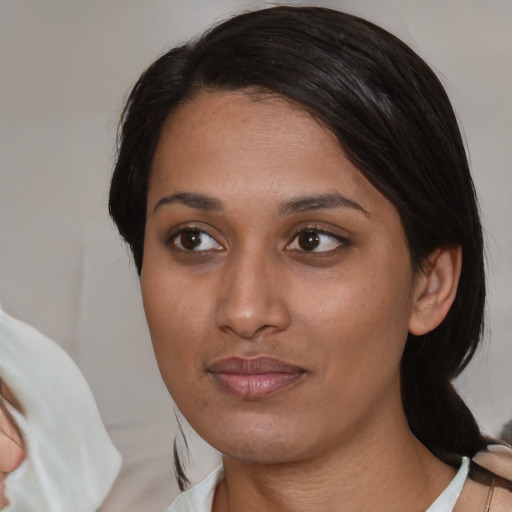 Neutral asian young-adult female with medium  brown hair and brown eyes