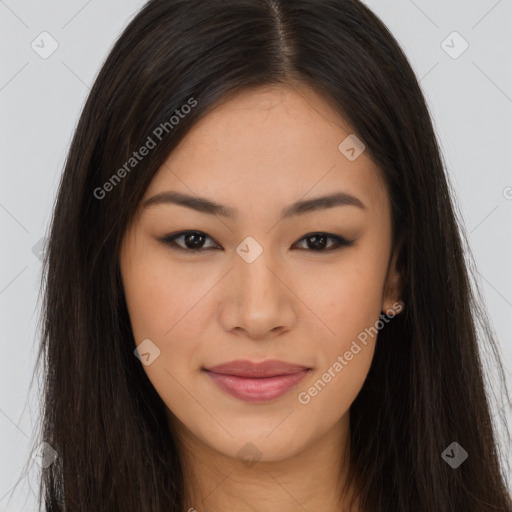 Joyful asian young-adult female with long  brown hair and brown eyes