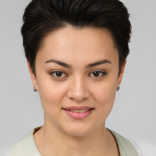 Joyful asian young-adult female with short  brown hair and brown eyes