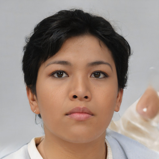 Neutral asian young-adult female with short  brown hair and brown eyes