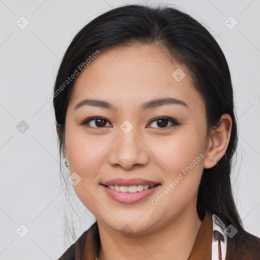 Joyful white young-adult female with long  brown hair and brown eyes