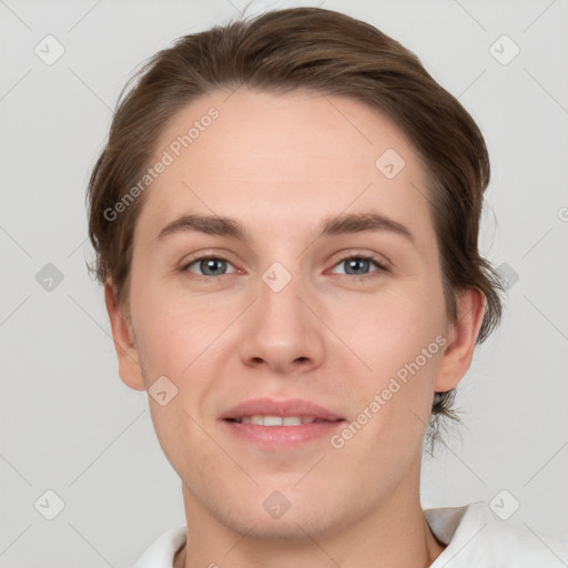 Joyful white young-adult female with short  brown hair and grey eyes