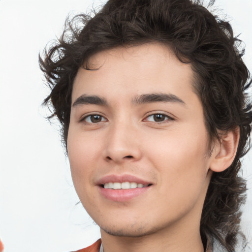 Joyful white young-adult male with medium  brown hair and brown eyes