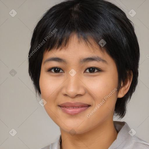 Joyful asian young-adult female with medium  black hair and brown eyes