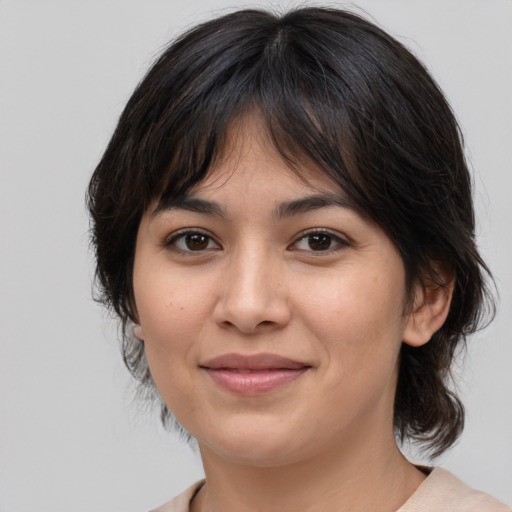 Joyful white young-adult female with medium  brown hair and brown eyes