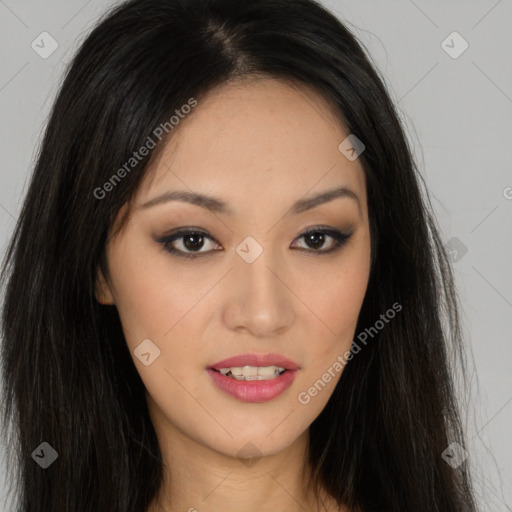 Joyful asian young-adult female with long  brown hair and brown eyes