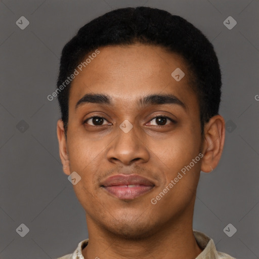 Joyful black young-adult male with short  black hair and brown eyes