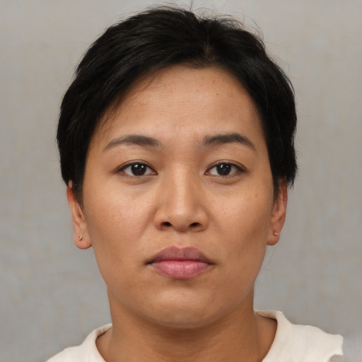 Neutral asian young-adult female with short  brown hair and brown eyes