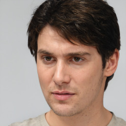 Neutral white adult male with short  brown hair and brown eyes